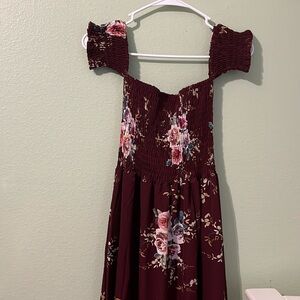 Off the shoulders, stretchy top middle flowery,slitted bottom full length dress.